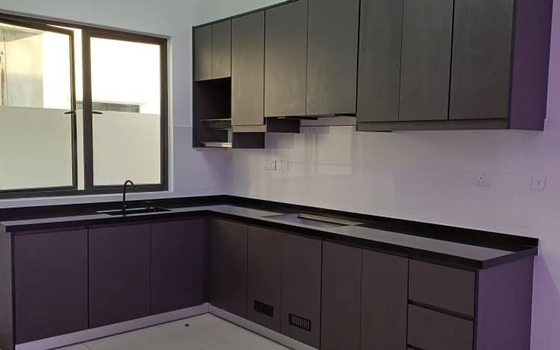 Elegant Dark Tones custom kitchen in Shah Alam by Orked Kitchen Cabinet
