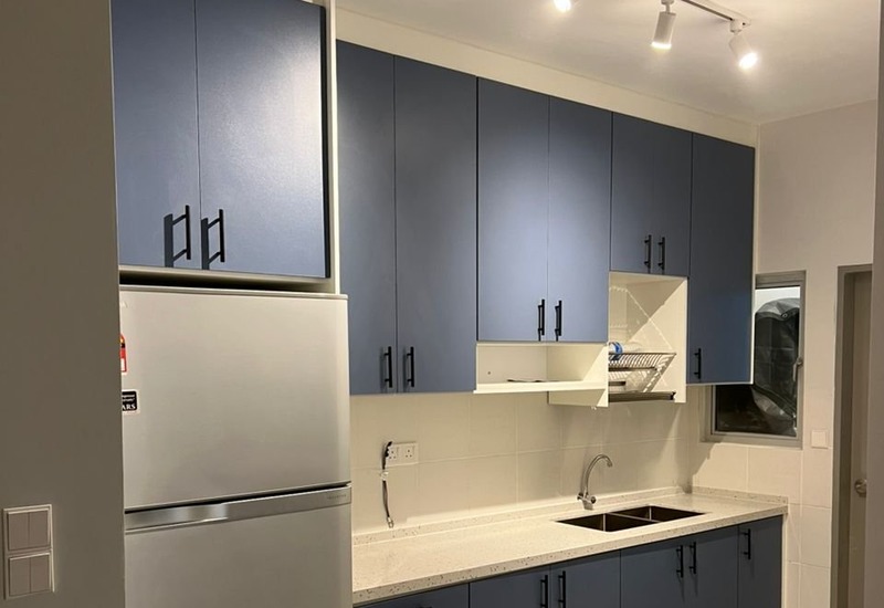 Modern Classic slate blue kitchen in Puchong by Orked Kitchen Cabinet
