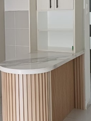 Warm fluted panel and ceramic styling by Orked Kitchen Cabinet